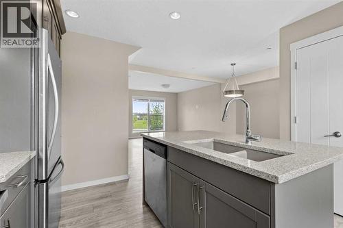 44 Howse Drive Ne, Calgary, AB - Indoor Photo Showing Kitchen With Double Sink With Upgraded Kitchen