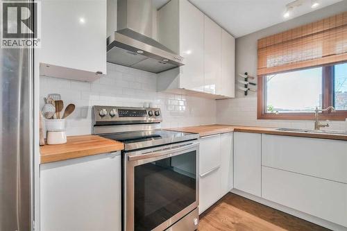 10427 Wapiti Drive Se, Calgary, AB - Indoor Photo Showing Kitchen