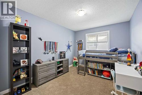 202 Royal Oak Heath Nw, Calgary, AB - Indoor Photo Showing Bedroom