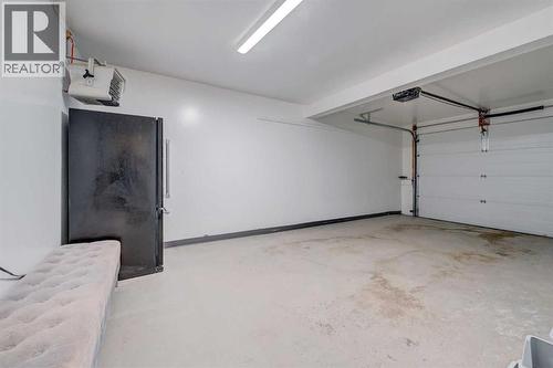 43, 5019 46 Avenue Sw, Calgary, AB - Indoor Photo Showing Garage