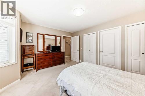 417 Hope Bay, Rural Rocky View County, AB - Indoor Photo Showing Bedroom