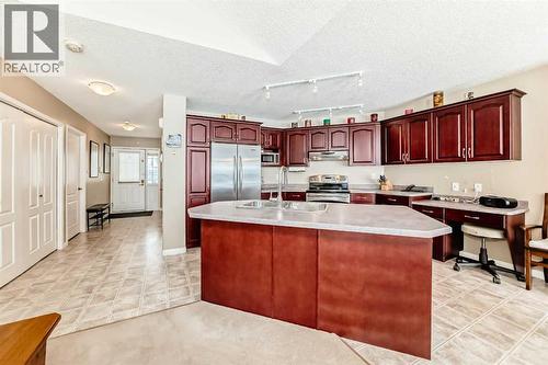 417 Hope Bay, Rural Rocky View County, AB - Indoor Photo Showing Kitchen With Double Sink