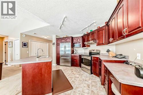 417 Hope Bay, Rural Rocky View County, AB - Indoor Photo Showing Kitchen