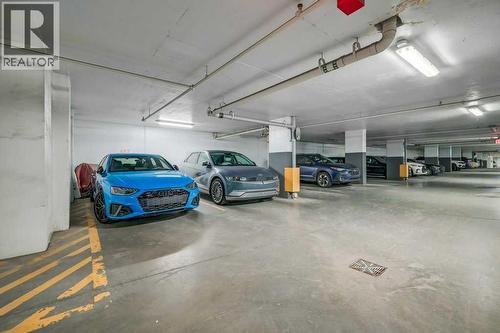 410, 560 6 Avenue Se, Calgary, AB - Indoor Photo Showing Garage