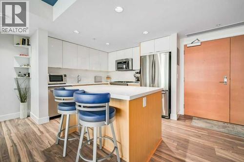 410, 560 6 Avenue Se, Calgary, AB - Indoor Photo Showing Kitchen With Stainless Steel Kitchen With Upgraded Kitchen