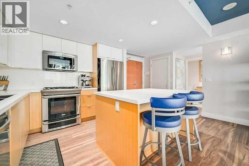 410, 560 6 Avenue Se, Calgary, AB - Indoor Photo Showing Kitchen With Stainless Steel Kitchen With Upgraded Kitchen