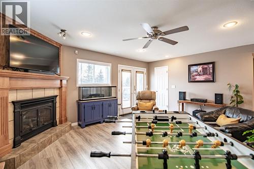 82 Westglen Boulevard, Blackfalds, AB - Indoor Photo Showing Living Room With Fireplace