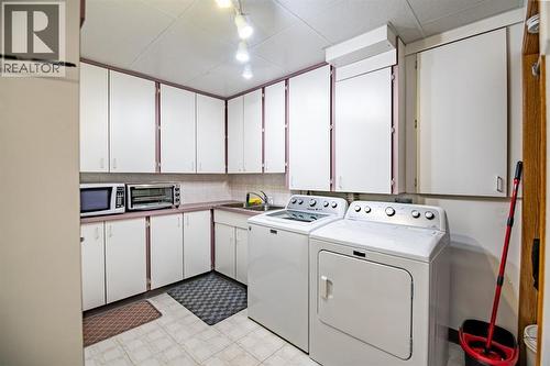 82 Westglen Boulevard, Blackfalds, AB - Indoor Photo Showing Laundry Room