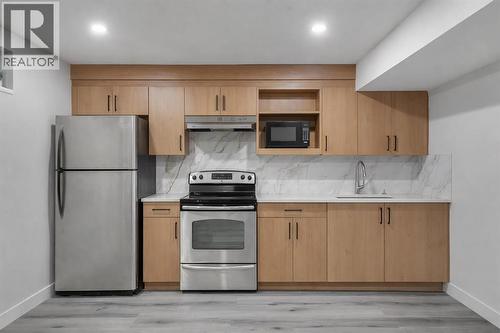 52 Saddlecreek Terrace Ne, Calgary, AB - Indoor Photo Showing Kitchen