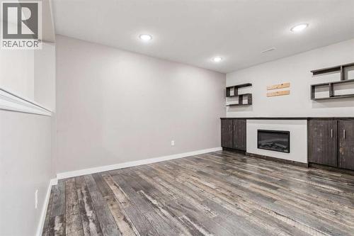 1005 Eagleview Place Nw, High River, AB - Indoor With Fireplace