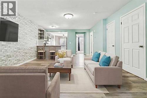 1005 Eagleview Place Nw, High River, AB - Indoor Photo Showing Living Room