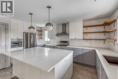 632 Cantrell Drive Sw, Calgary, AB - Indoor Photo Showing Kitchen With Double Sink With Upgraded Kitchen