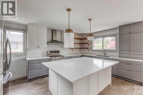 632 Cantrell Drive Sw, Calgary, AB - Indoor Photo Showing Kitchen With Upgraded Kitchen