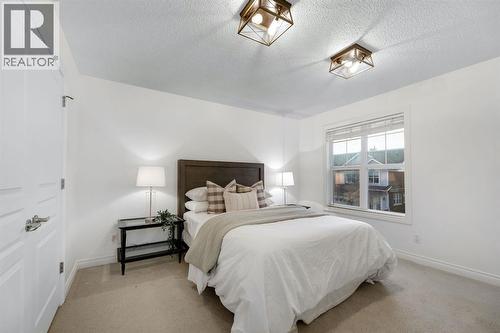 12, 10 St Julien Drive Sw, Calgary, AB - Indoor Photo Showing Bedroom