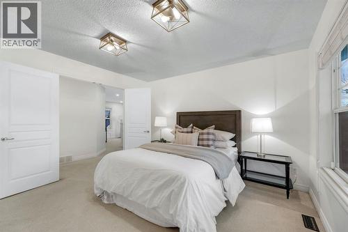 12, 10 St Julien Drive Sw, Calgary, AB - Indoor Photo Showing Bedroom