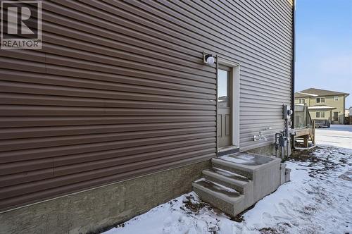 Side Entrance for Basement - 292 Cornerbrook Drive Ne, Calgary, AB - Outdoor