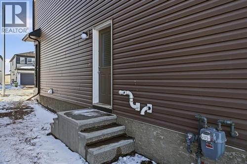 Side Entrance - 292 Cornerbrook Drive Ne, Calgary, AB - Outdoor With Exterior