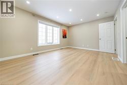 Unfurnished room featuring recessed lighting and light wood-style flooring - 