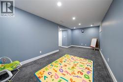Playroom featuring carpet and recessed lighting - 