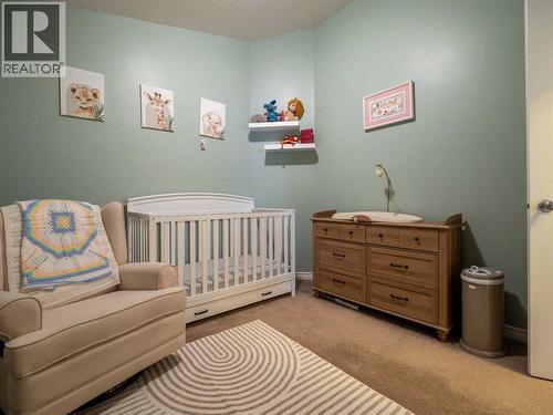 263 Mt Sunburst Way W, Lethbridge, AB - Indoor Photo Showing Bedroom