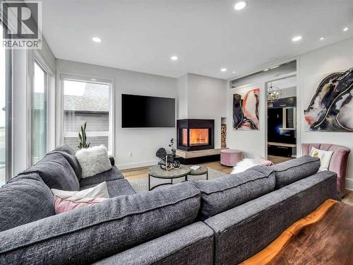 19 Stonecrest Point W, Lethbridge, AB - Indoor Photo Showing Living Room With Fireplace