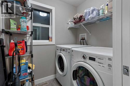 774 Marie Van Haarlem Crescent N, Lethbridge, AB - Indoor Photo Showing Laundry Room