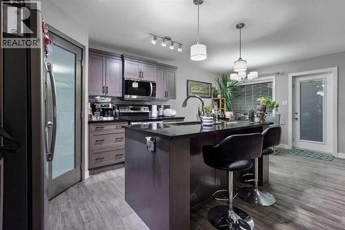 774 Marie Van Haarlem Crescent N, Lethbridge, AB - Indoor Photo Showing Kitchen With Upgraded Kitchen
