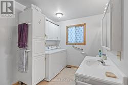 Main floor 3 pc bathroom with laundry - 