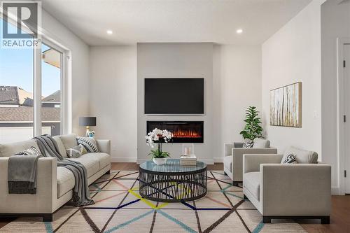 Virtually Staged - 152 Sage Hill Heights Nw, Calgary, AB - Indoor Photo Showing Living Room