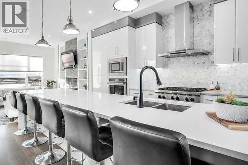 2415 25 Avenue Nw, Calgary, AB - Indoor Photo Showing Kitchen With Double Sink With Upgraded Kitchen
