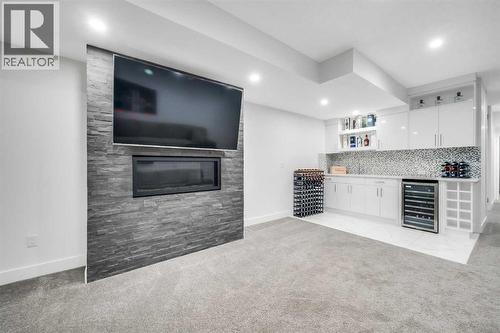 Wet Bar - 2415 25 Avenue Nw, Calgary, AB - Indoor With Fireplace
