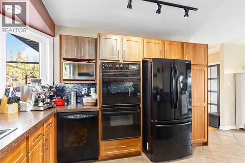 39 Poplar Crescent, Gregoire Lake Estates, AB - Indoor Photo Showing Kitchen