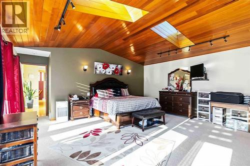 39 Poplar Crescent, Gregoire Lake Estates, AB - Indoor Photo Showing Bedroom