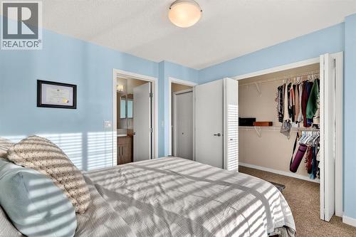 330 Marquis Lane Se, Calgary, AB - Indoor Photo Showing Bedroom