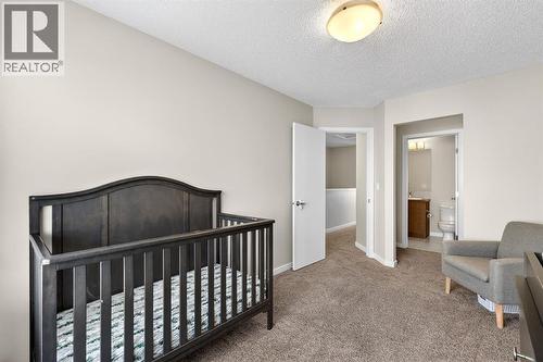 330 Marquis Lane Se, Calgary, AB - Indoor Photo Showing Bedroom