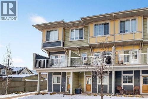 Quiet location/not on main road - 330 Marquis Lane Se, Calgary, AB - Outdoor With Balcony With Facade