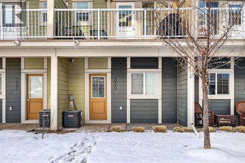 330 Marquis Lane Se, Calgary, AB - Outdoor With Balcony With Facade