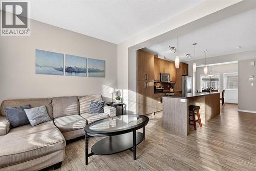 330 Marquis Lane Se, Calgary, AB - Indoor Photo Showing Living Room