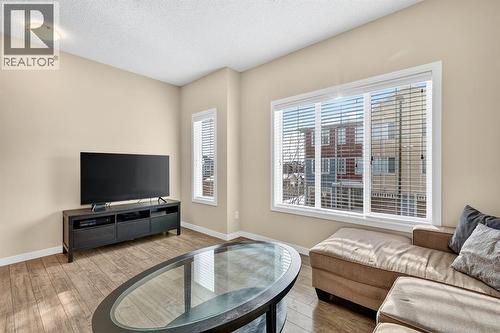 330 Marquis Lane Se, Calgary, AB - Indoor Photo Showing Living Room
