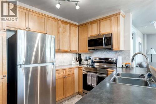 905, 836 15 Avenue Sw, Calgary, AB - Indoor Photo Showing Kitchen With Stainless Steel Kitchen With Double Sink