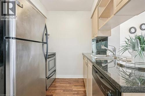 2325 Central Park Drive Unit# 507, Oakville, ON - Indoor Photo Showing Kitchen With Double Sink