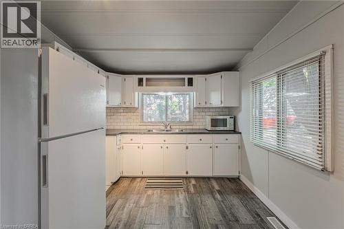 99 Fourth Concession Road Unit# 196, Burford, ON - Indoor Photo Showing Kitchen With Double Sink