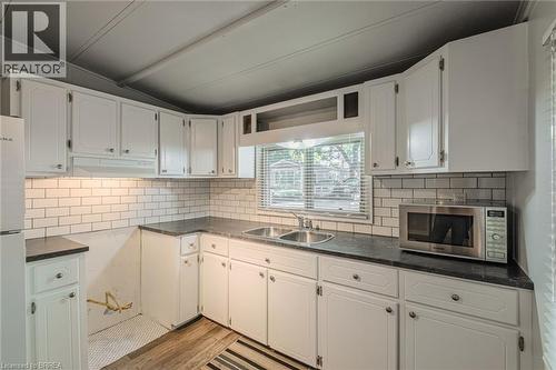 99 Fourth Concession Road Unit# 196, Burford, ON - Indoor Photo Showing Kitchen With Double Sink