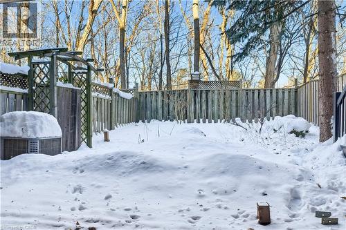 Snowy yard featuring a fenced backyard - 1489 Litchfield Road, Oakville, ON - Outdoor
