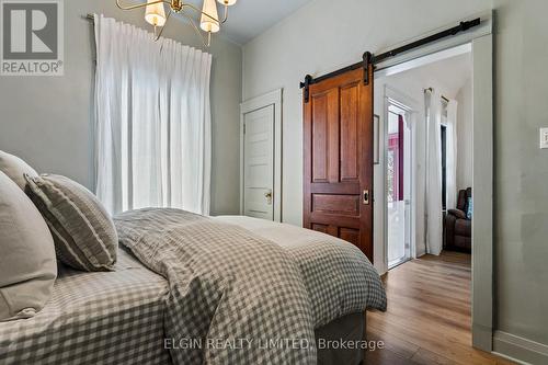 Sliding barn door and closet door - 84 Pleasant Avenue, St. Catharines (Downtown), ON - Indoor Photo Showing Bedroom
