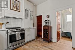 Doors to basement and family bathroom from kitchen - 