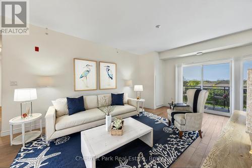 Virtually Staged - 304 - 1 Chamberlain Crescent, Collingwood, ON - Indoor Photo Showing Living Room