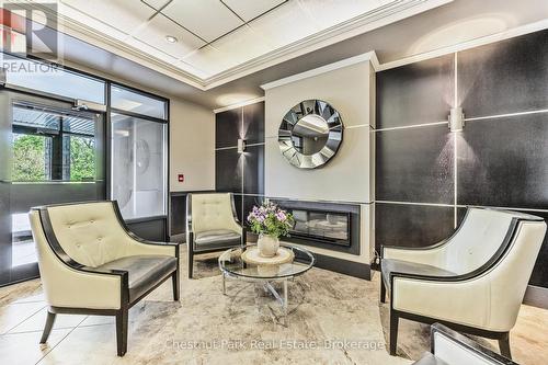 304 - 1 Chamberlain Crescent, Collingwood, ON - Indoor Photo Showing Other Room With Fireplace