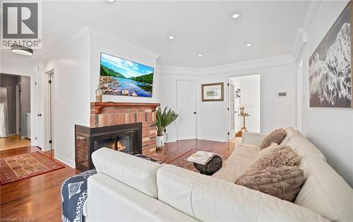 2110 Cleaver Avenue Unit# 242, Burlington, ON - Indoor Photo Showing Living Room With Fireplace