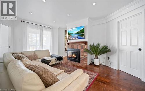 2110 Cleaver Avenue Unit# 242, Burlington, ON - Indoor Photo Showing Living Room With Fireplace